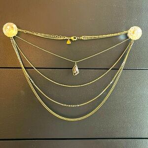 Silpada’s K&R multi tiered brass necklace